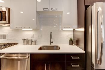Beautiful granite-style countertops and new tile flooring